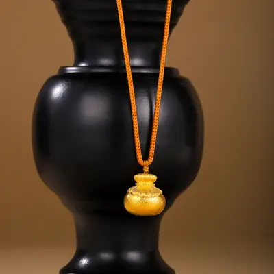 足金古法祈福锤纹莲花福袋吊坠